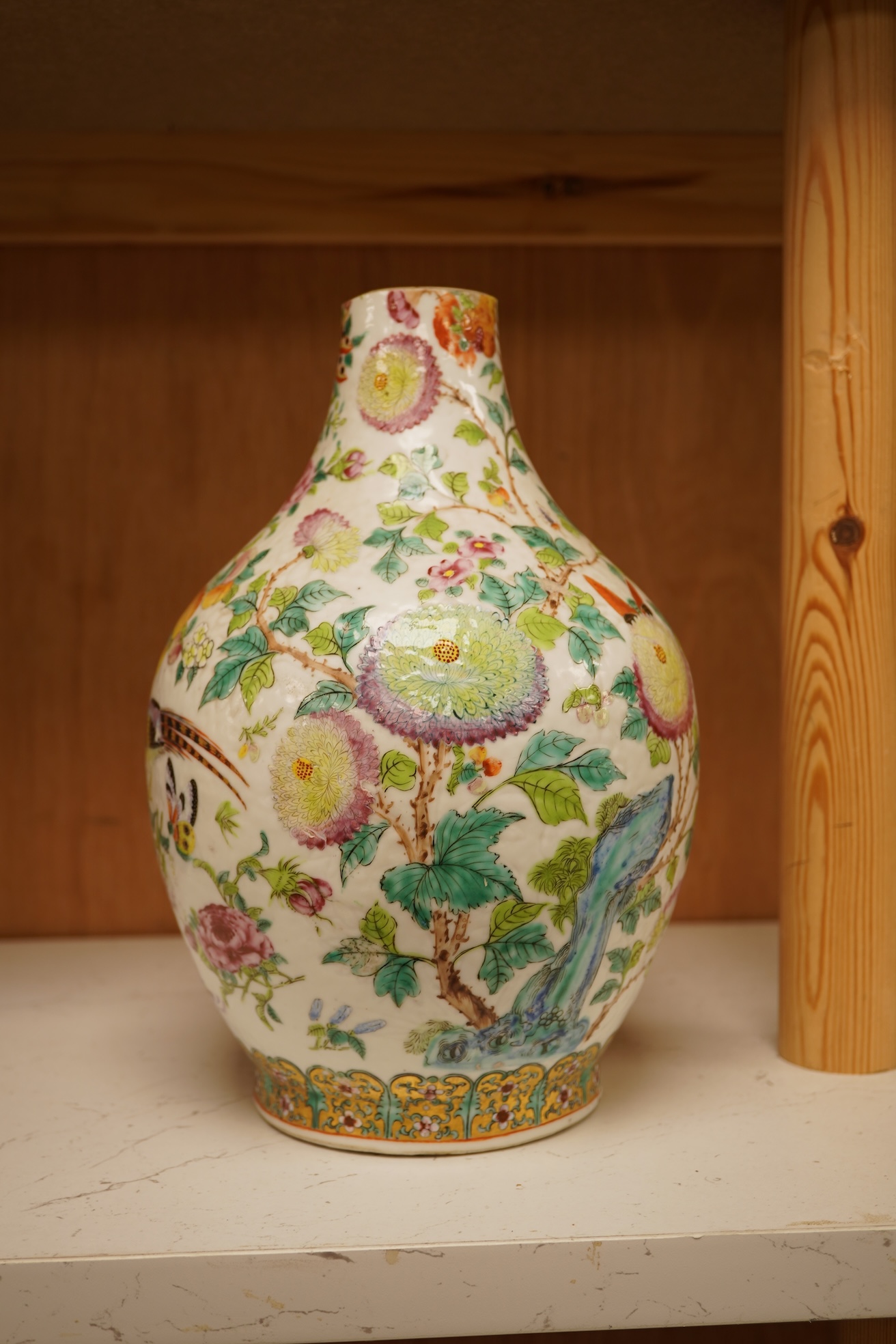 A 19th century Chinese famile rose vase, with an altered neck, 25cm high